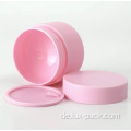 Leerer schwarz weiß rosa kosmetischer Kosmetikcremesbehälter